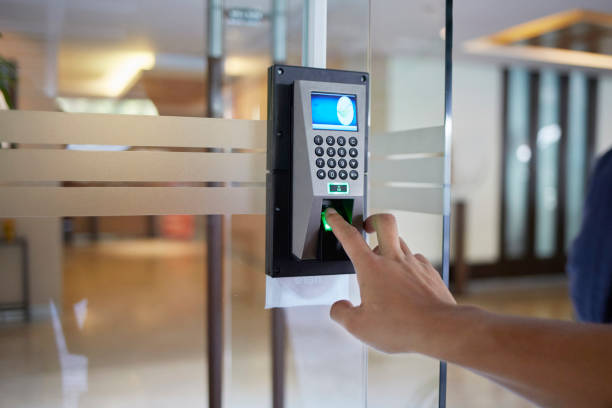 Yong Man Push Down The Electronic Control Machine To Access The Door Commercial Locksmith Service in Pflugerville TX , Biometric Installation