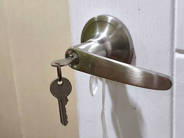 Doorknob On Toilet Wood Door. Safety Concept Door Lock Repair and Car Key Replacement in Burnet TX