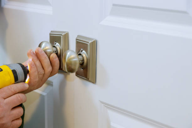 Master With Screwdriver Installs Access The Room Door New Dummy Lock In House. 512 Emergency Locksmith in Bastrop TX ready to serve you anytime, anywhere.