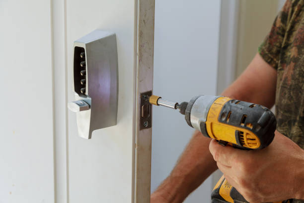 Man Installing Of The Door With Lock Key Security 512 Locksmith for any Emergency in Burnet TX