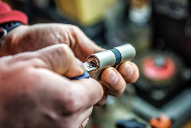 Professional Master Testing Door Lock Cylinder With Key. Locksmith Theme Lock and Key Services by 512 Locksmith Services in Kyle TX
